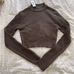 Cropped garage sweater